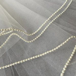 NWOT Pearl-edged shoulder-length wedding veil